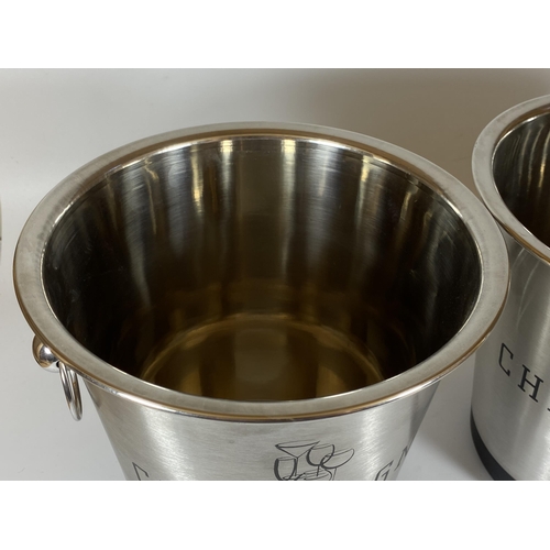 101 - A PAIR OF CHROME EFFECT CHAMPAGNE CUVEE GRAND CRU ICE BUCKETS, HEIGHT 21CM