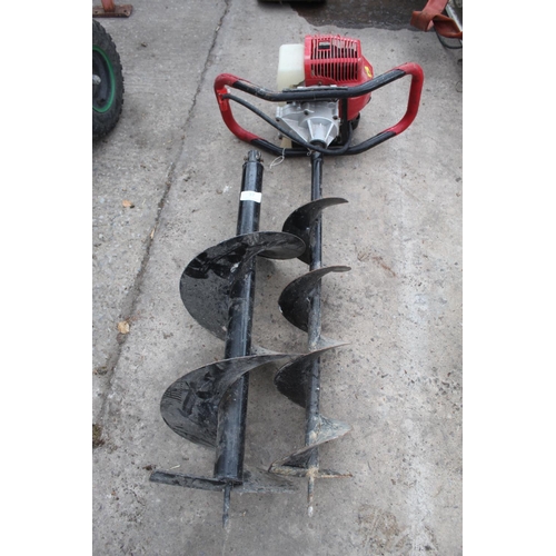 37 - A PETROL ENGINED POST HOLE BORER WITH TWO BORER BLADES  + VAT