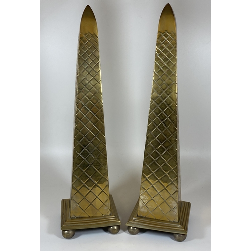 12 - A PAIR OF HEAVY SOLID BRASS TALL OBELISK COLUMNS, HEIGHT 44CM