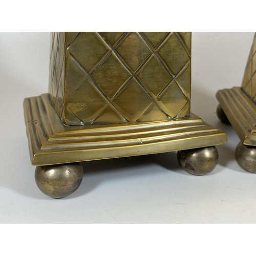 12 - A PAIR OF HEAVY SOLID BRASS TALL OBELISK COLUMNS, HEIGHT 44CM