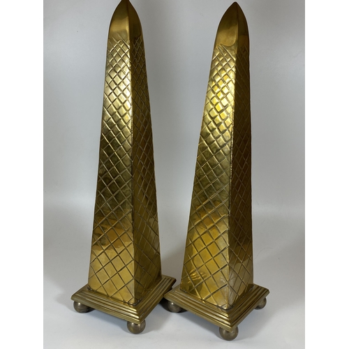 12 - A PAIR OF HEAVY SOLID BRASS TALL OBELISK COLUMNS, HEIGHT 44CM