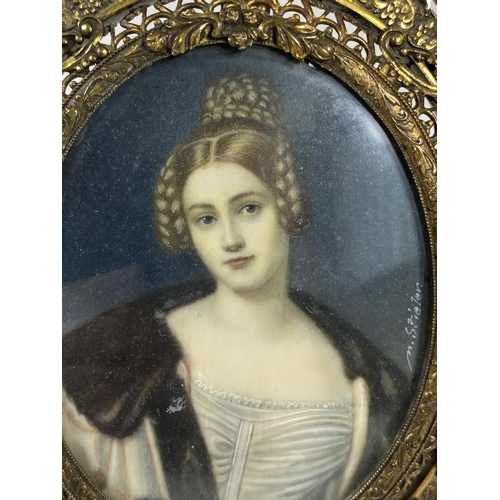 6 - AN EARLY 19TH CENTURY HAND PAINTED PORTRAIT OF A LADY, SIGNED M.STIELER, IN ORNATE BRASS OVAL FRAME ... 