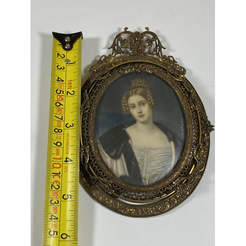 6 - AN EARLY 19TH CENTURY HAND PAINTED PORTRAIT OF A LADY, SIGNED M.STIELER, IN ORNATE BRASS OVAL FRAME ... 