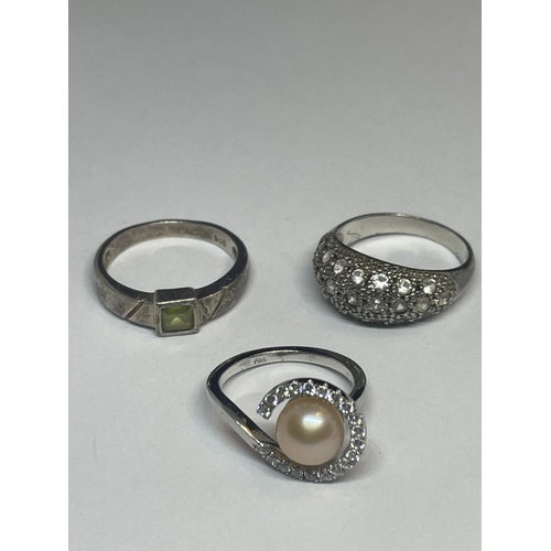 521 - FIVE VARIOUS SILVER RINGS