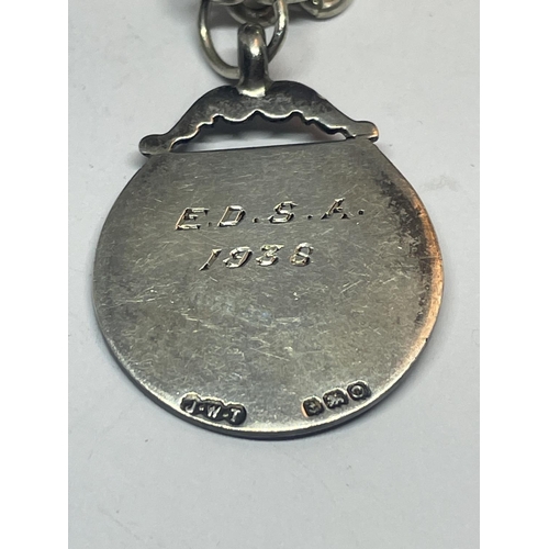 526 - A SILVER HALF ALBERT CHAIN WITH A HALLMARKED BIRMINGHAM FOB