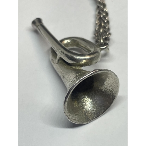 533 - A SILVER NECKLACE WITH TRUMPET PENDANT IN A PRESENTATION BOX