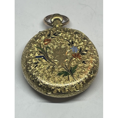 553 - AN ORNATE 18 CARAT GOLD FOB WATCH WITH WHITE ENAMAL FACE AND ROMAN NUMERALS WITH FLOWER DESIGN TO TH... 