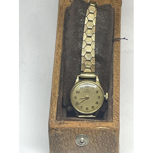 554 - A 9 CARAT GOLD LADIES OMEGA WRST WATCH IN ITS ORIGINAL BOX