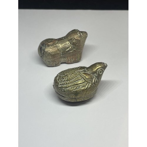 556 - TWO WHITE METAL LIDDED POTS IN THE FORM OF ANIMALS