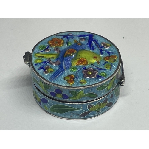 570 - A SILVER CIRCULAR PILL BOX WITH ENAMEL BIRD DESIGN LID AND SIDES