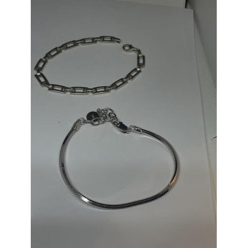 571 - FOUR SILVER BRACELETS