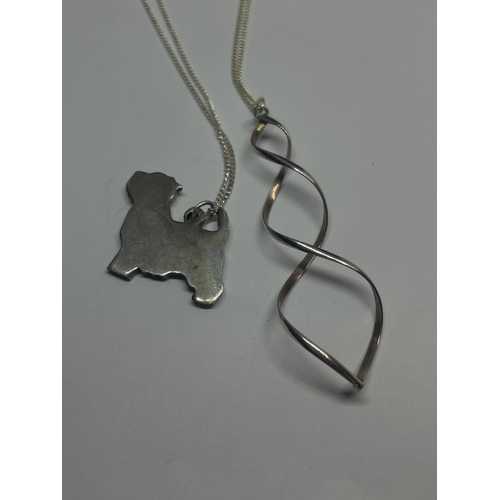 586 - FOUR SILVER NECKLACES WITH PENDANTS