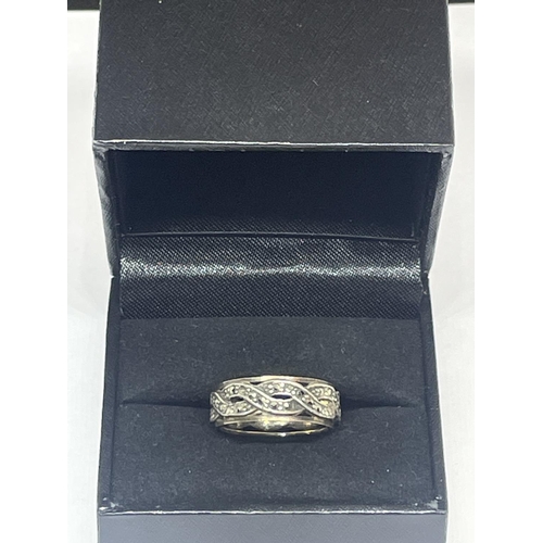 587 - A GOLD AND SILVER TWIST DESIGN ETERNITY RING IN A PRESENTATION BOX