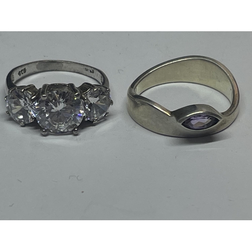 593 - FOUR VARIOUS SILVER RINGS