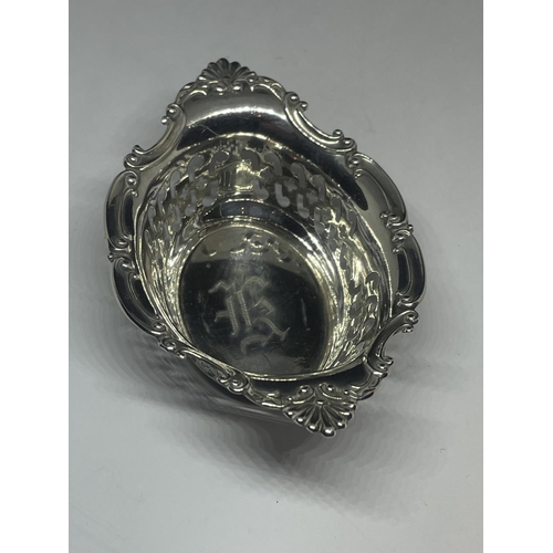 595 - A DECORATIVE STERLING SILVER DISH WITH PIERCED SIDES