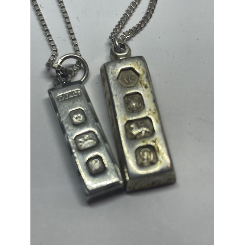 612 - TWO SILVER NECKLACES WITH INGOT PENDANTS