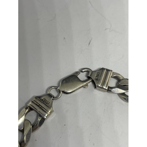 622 - A HEAVY SILVER FLAT LINK BRACELET