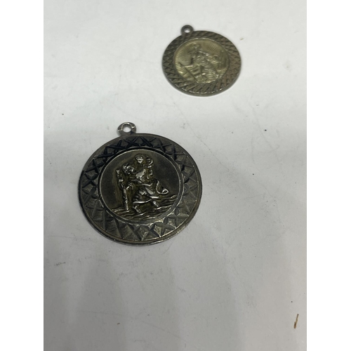 625 - FIVE SILVER ST CHRISTOPHER PENDANTS