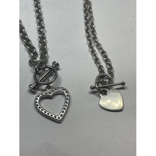 626 - TWO SILVER T BAR NECKLACES WITH HEART PENDANTS