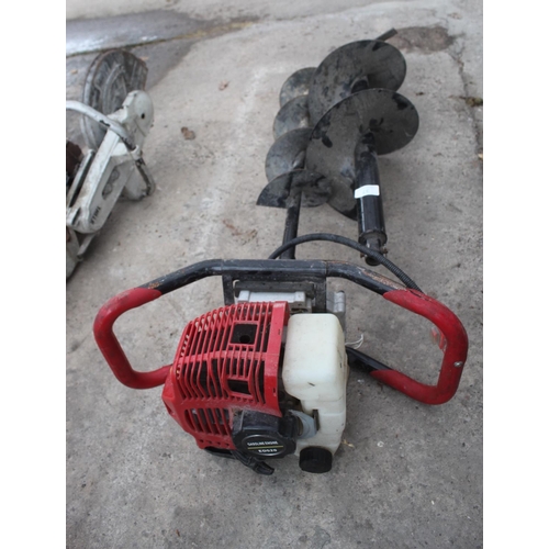 37 - A PETROL ENGINED POST HOLE BORER WITH TWO BORER BLADES  + VAT