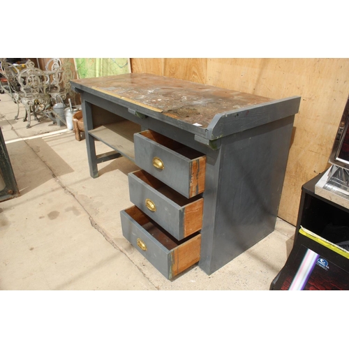 85A - A WOODEN WORKSHOP BENCH WITH THREE LOWER DRAWERS WITH BRASS SCOOP HANDLES - NO VAT