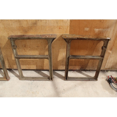 65A - A PAIR OF HEAVY VINTAGE CAST IRON INDUSTRIAL WORKSHOP TABLE ENDS - NO VAT