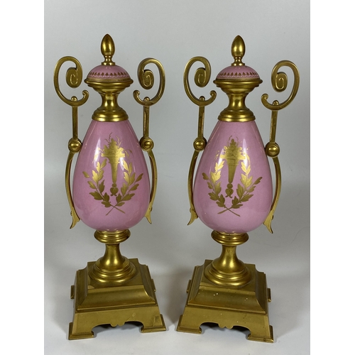 17 - A PAIR OF FRENCH 19TH CENTURY, POSSIBLY SEVRES, PINK PORCELAIN AND BRASS GARNITURE VASES WITH HAND P... 