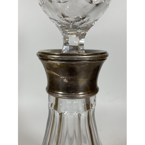 30 - A CUT GLASS SHIPS DECANTER WITH MAPPIN & WEBB HALLMARKED SILVER COLLAR, HALLMARKS FOR BIRMINGHAM 199... 