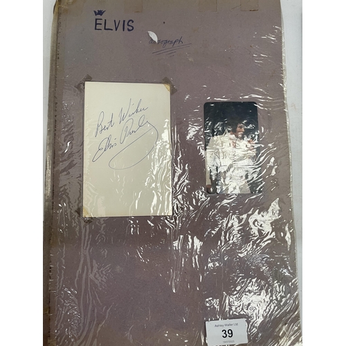 39 - A 1970'S ELVIS PRESLEY AUTOGRAPH FROM AN ELVIS PRESLEY SCRAP BOOK - BELIEVED AUTHENTIC BUT NO PROVED... 