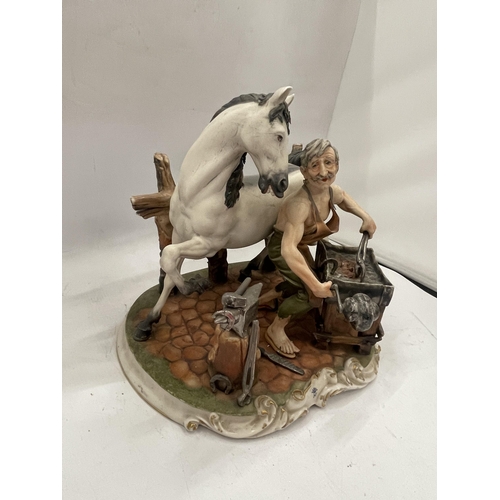 43 - A VINTAGE CAPODIMONTE FIGURE OF A HORSE AND BLACKSMITH, SIGNED