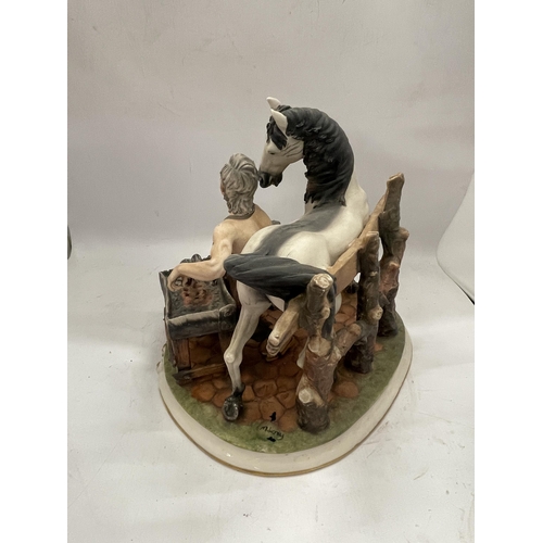 43 - A VINTAGE CAPODIMONTE FIGURE OF A HORSE AND BLACKSMITH, SIGNED