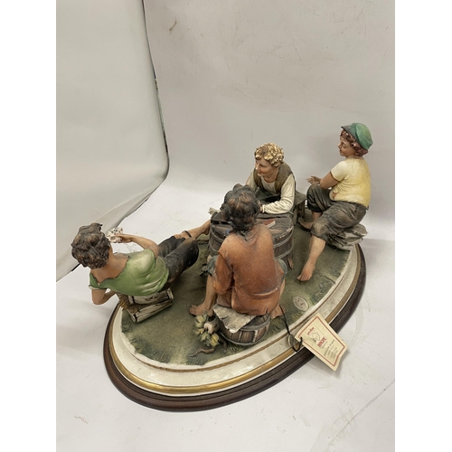 46 - A CAPODIMONTE THE CARD CHEAT FIGURE GROUP, SIGNED CAZZOLA WITH TAG