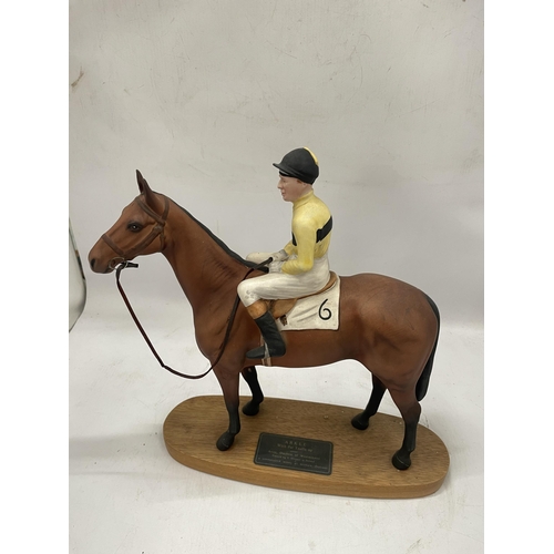 47 - A BESWICK CONNOISSEUR HORSE AND JOCKEY FIGURE - ARKLE WITH PAT TAAFFE UP ON WOODEN BASE