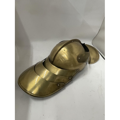 64 - A VINTAGE BRASS EFFECT KNIGHTS HELMET