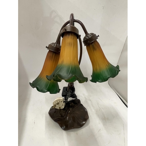 69 - A VINTAGE TIFFANY STYLE LAMP WITH THREE FROSTED GLASS SHADES