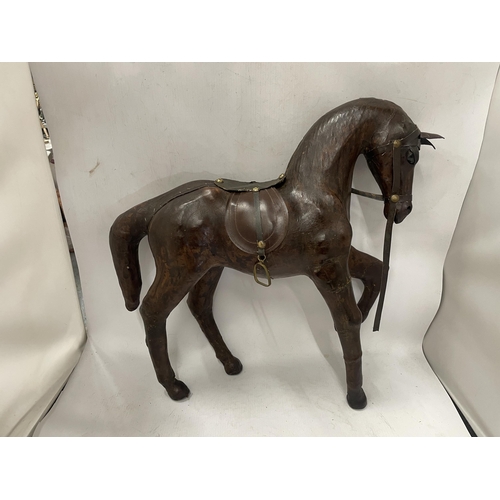 73 - A LARGE VINTAGE LEATHER MODEL OF A HORSE