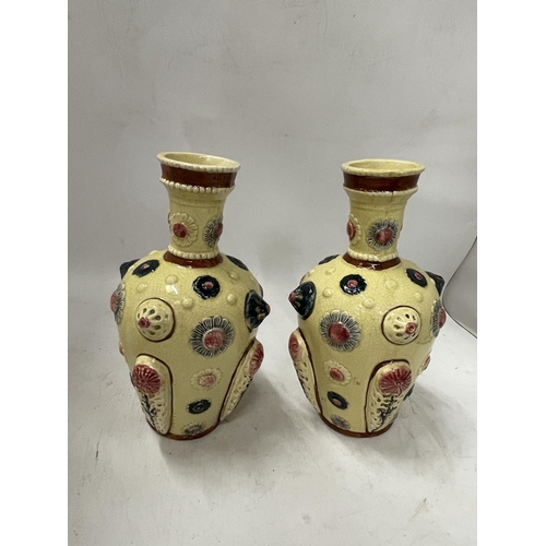 78 - A PAIR OF CONTINENTAL PORCELAIN VASES IN THE ZSOLNAY PECS STYLE, UNMARKED