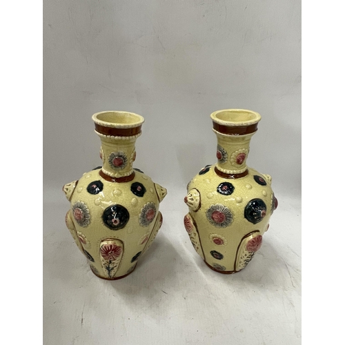 78 - A PAIR OF CONTINENTAL PORCELAIN VASES IN THE ZSOLNAY PECS STYLE, UNMARKED