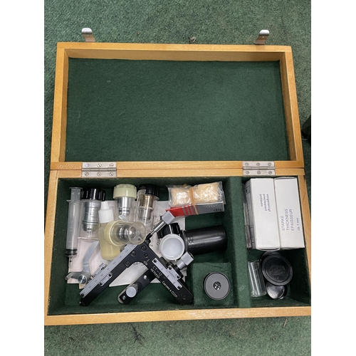 84 - A GS LONDON M 57805 MICROSCOPE AND ASSORTED SLIDES AND ACCESSORIES IN WOODEN BOX