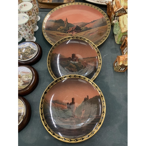 115 - THREE VINTAGE VILLEROY & BOCH WALL PLATES, WITH GERMAN SCENES, MARKED TO THE BACK IN GREEN WITH VILL... 