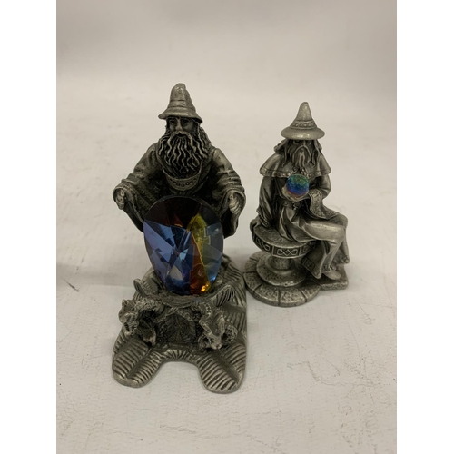 121 - FOUR PEWTER STYLE WIZARDS WITH CRYSTALS