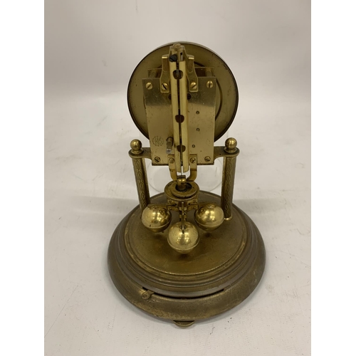 125 - A BRASS ANNIVERSARY CLOCK WITH A DOME