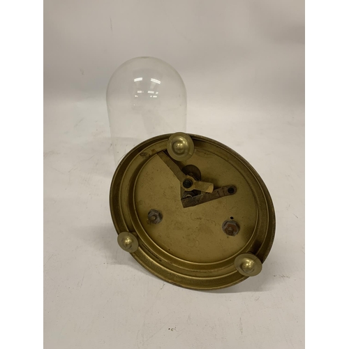 125 - A BRASS ANNIVERSARY CLOCK WITH A DOME