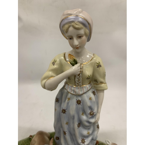 126 - A VINTAGE CERAMIC TABLEAU OF A LADY WITH FARM ANIMALS WITH BLUE CROSSED SWORDS AND R TO BASE