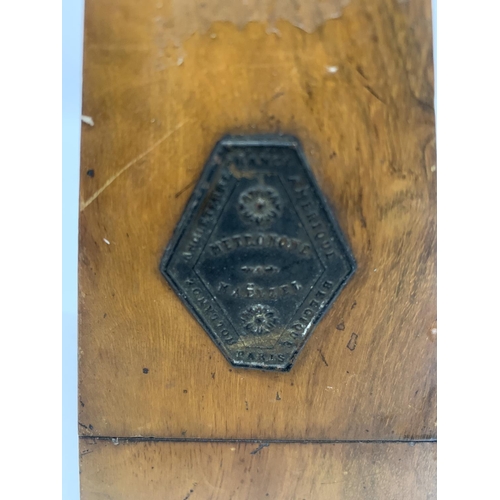 129 - A MAHOGANY CASED METRONOME