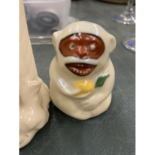 139 - A VINTAGE GERMAN SENTRY BOX SPILL HOLDER AND A CARLTON CRESTED WARE MONKEY