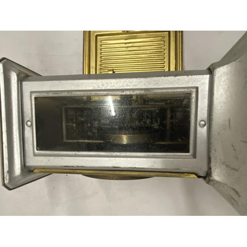 169A - A VINTAGE BRASS AND METAL MANTLE CLOCK