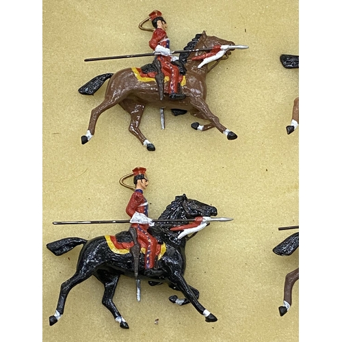 174A - SIX METAL ROYAL HORSE LANCERS CIRCA 1900 LLIVERY