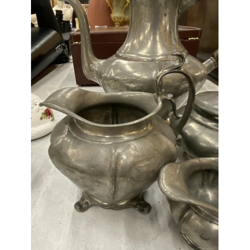 181 - A PEWTER TEASET TO INCLUDE TEAPOT, SUGAR, MILK AND HOT WATER JUG