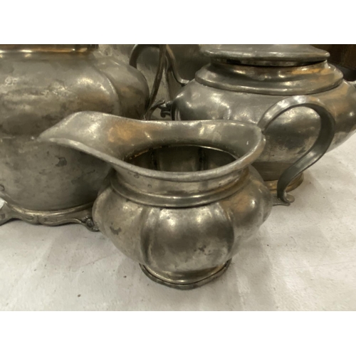 181 - A PEWTER TEASET TO INCLUDE TEAPOT, SUGAR, MILK AND HOT WATER JUG